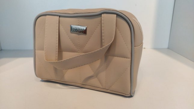 brown leather changing bolsa
