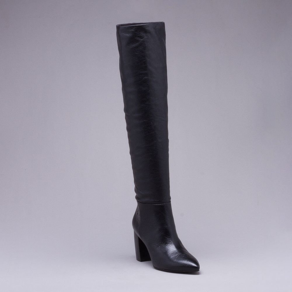 bota cano longo e salto alto